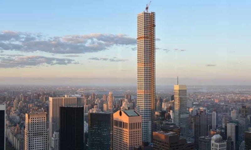 The slender 432 Park Avenue tower rising far above the surrounding Manhattan skyline