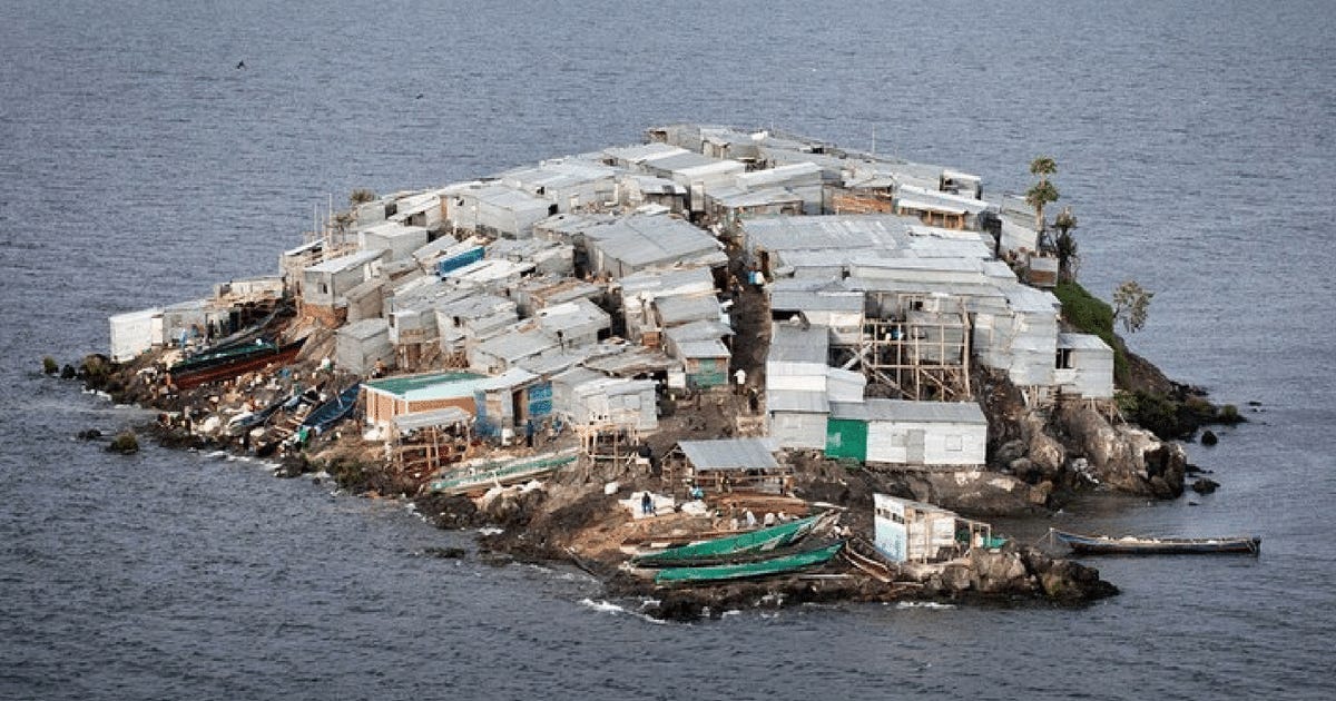Aerial photo of Migingo, a tiny rock island in Lake Victoria packed edge to edge with shacks